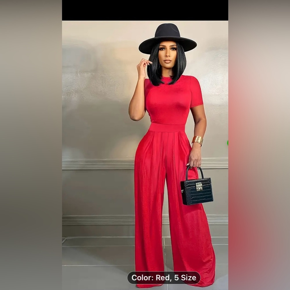 SOLD SOLD SOLD SOLD FOR 10 Dollars Jump suit red size large